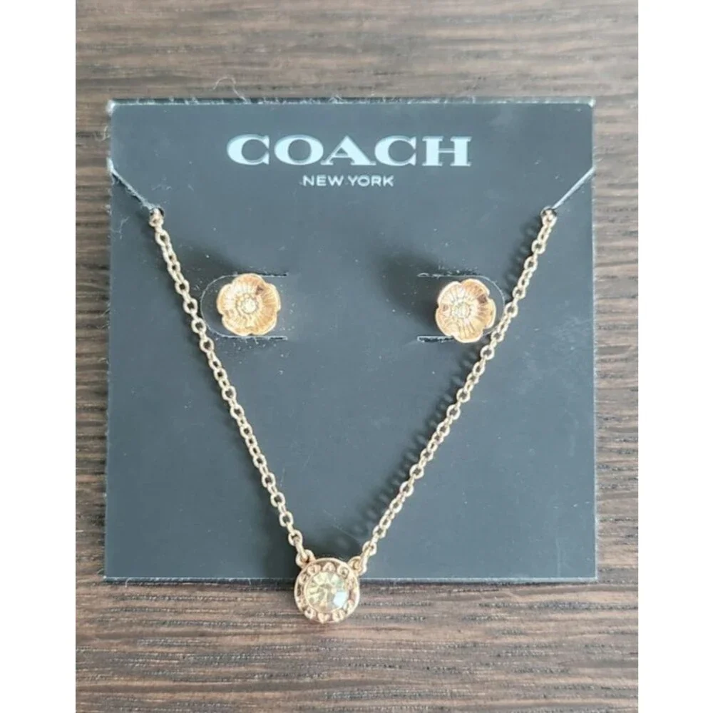 COACH Rose Gold Halo Necklace and Matching Flower Earring Set MSRP. $125